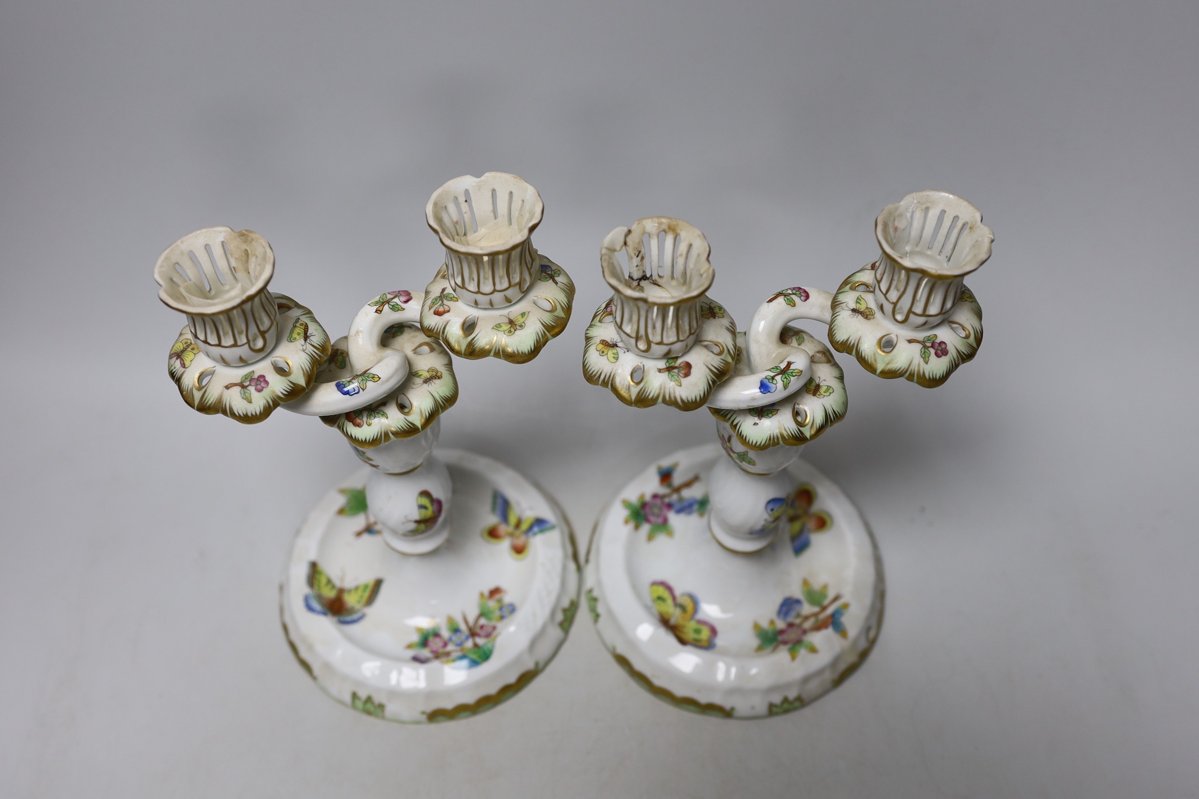 A pair of Herend porcelain two branch candelabra, 22cm